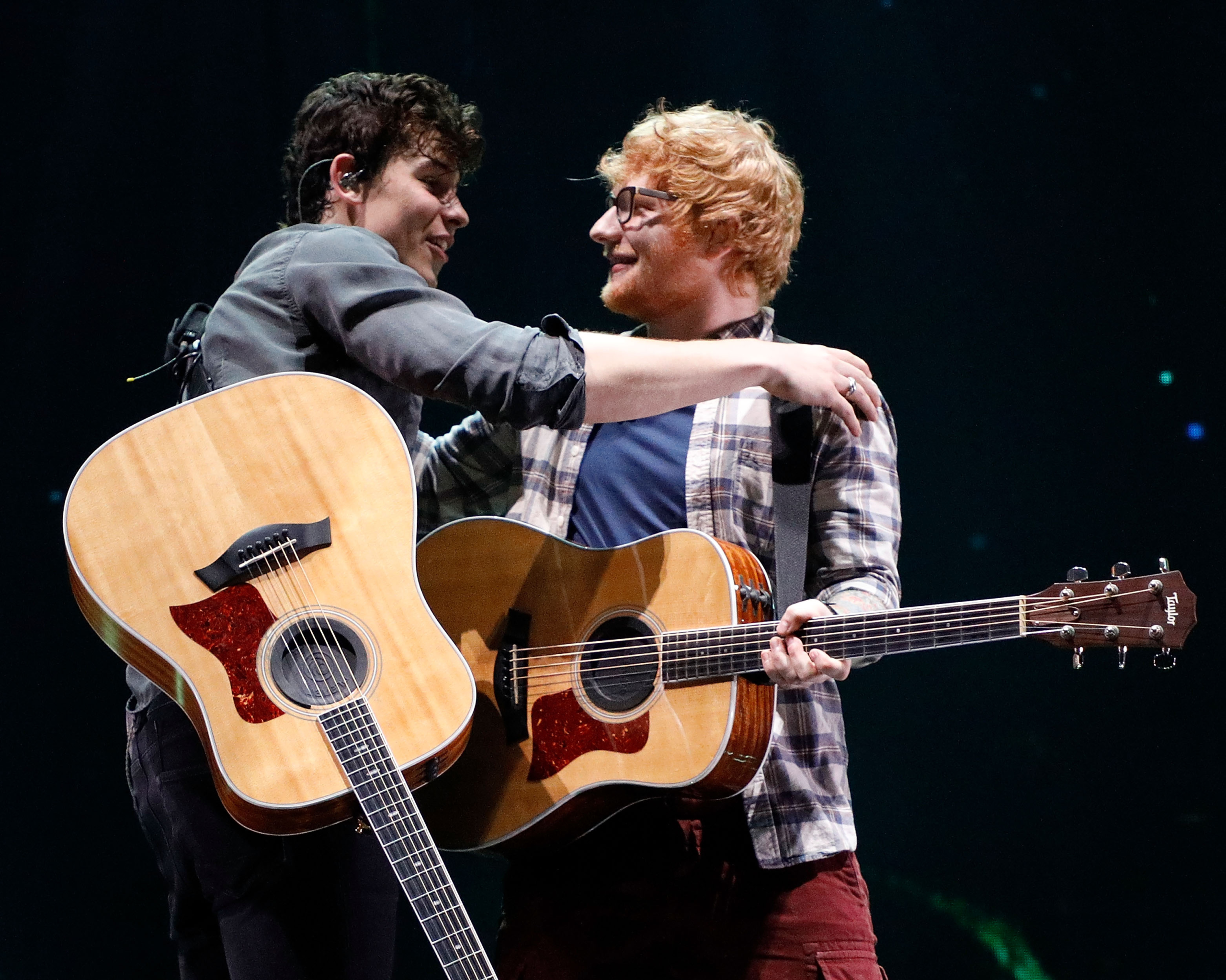 Shawn Mendes and Ed Sheeran performing on stage