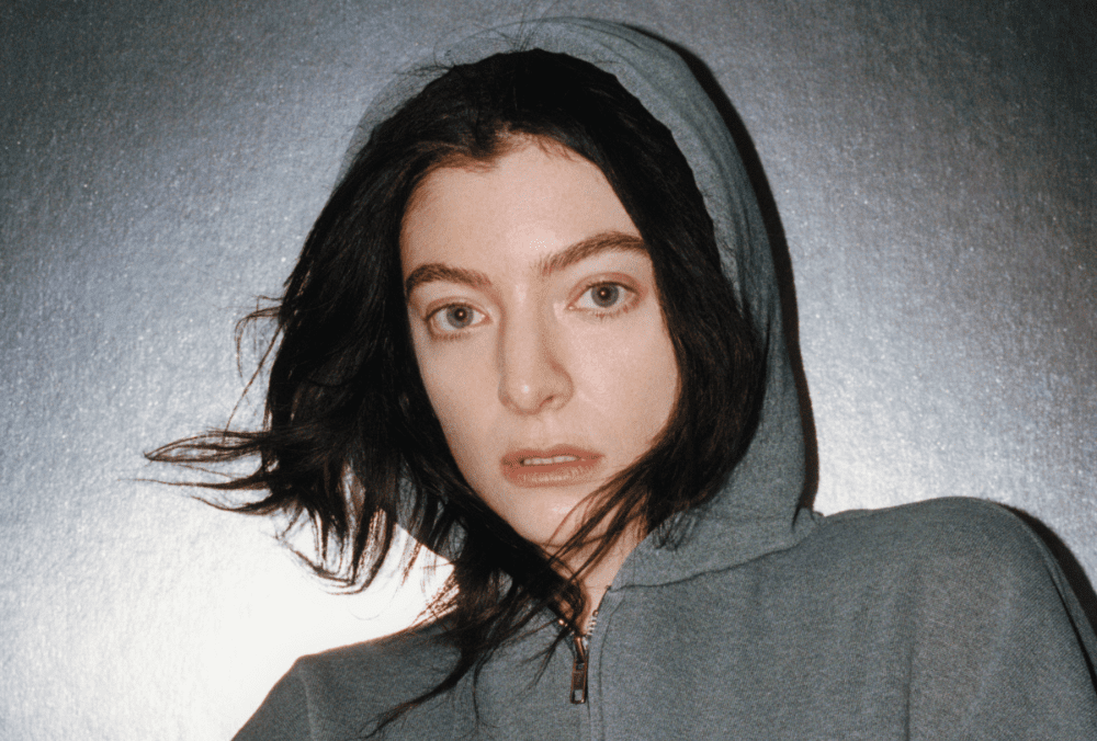 Lorde Gets A Tattoo In The Woods In Her New ‘Hammer’ Video
